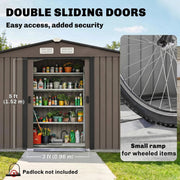 Double sliding doors open on the brown shed, 96 cm wide opening with a low threshold ramp