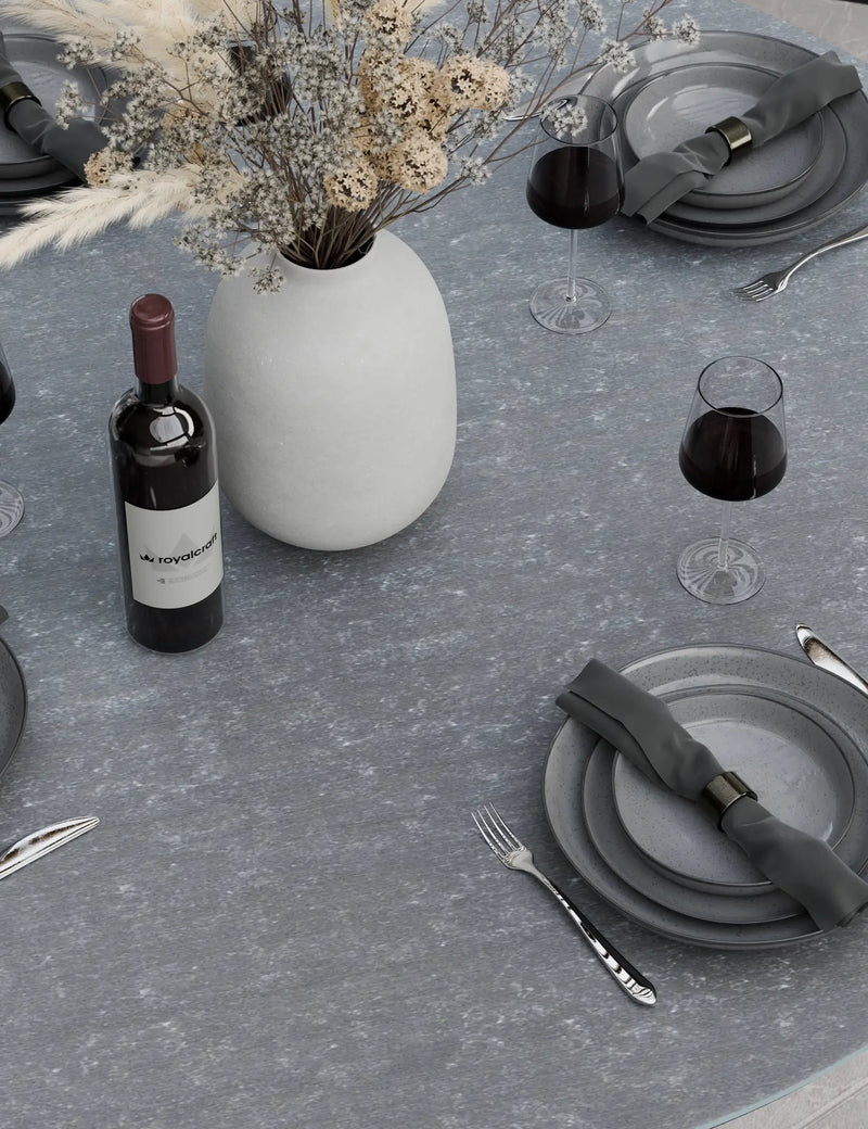 Grey ceramic round table top and rope chair detail on the Aspen 4 seater dining set