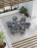 Aspen 6 seater round ceramic glass garden dining set seen from above, grey 150cm top with six rope chairs