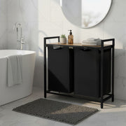 Bathroom with black double laundry basket, white bathtub, and grey rug.