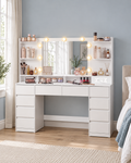 Cloud White dressing table with lit mirror, skincare on the shelves and makeup on the tabletop in a bedroom