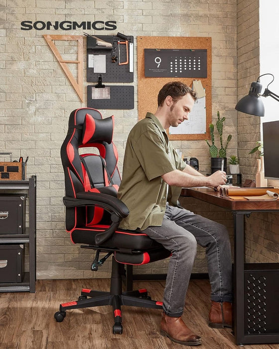 Image of a black and red gaming chair. This ergonomic gaming chair has a footrest, padded arms for extra support, adjustable lumbar support pillow, neck pillow, swivel wheels, an adjustable backrest, and adjustable height.