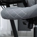 Image of a Grey Desk Chair With Flip Up Arms