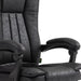 Image of a Black Executive Chair For Home Office With Footrest, swivel wheels and reclining backrest.