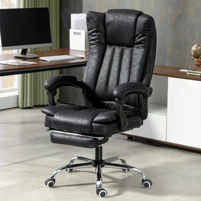 Image of a Black Executive Chair For Home Office With Footrest, swivel wheels and reclining backrest.