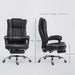 Image of a Black Executive Chair For Home Office With Footrest, swivel wheels and reclining backrest.