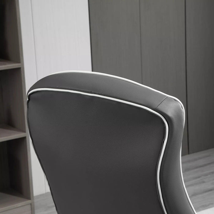 Image of a Grey Gaming Chair With Swivel Base, Adjustable Arms, Rocking Backrest, and Adjustable Height. It provides superior comfort for the ultimate gaming experience.