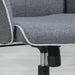 Image of a modern office desk chair upholstered in a stylish grey linen. The desk chair has a mid back with button tufting, armrests, swivel wheels, and adjustable height and backrest. This comfortable office chair is modern for yoru home office.