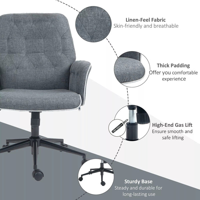 Image of a modern office desk chair upholstered in a stylish grey linen. The desk chair has a mid back with button tufting, armrests, swivel wheels, and adjustable height and backrest. This comfortable office chair is modern for yoru home office.