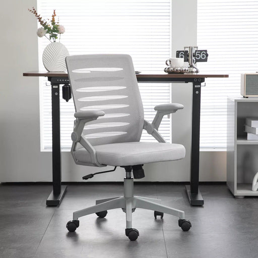 Image of a grey mesh office chair with wheels, lumbar support, arms rest and reclining backrest.