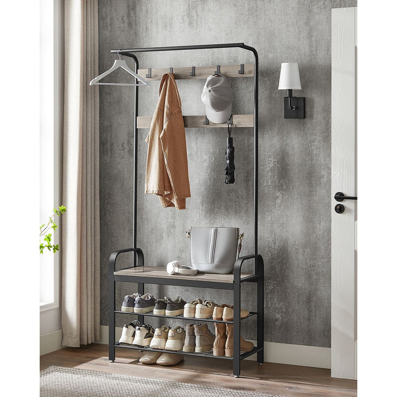 Greige and Black Vasagle coat rack in a hallway with coats and shoes on the shelves