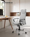 Image of a High Back Ergonomic Desk Chair With Wheels and Arms. The chair is upholstered in a stylish grey coloured fabric with black arms and chrome swivel base. 