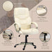 Image of a Comfortable Cream Leather Swivel Office Chair With Arms And Adjustable Height.