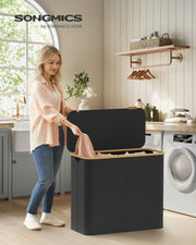 Songmics laundry basket lid open showing 4 mesh liner compartments