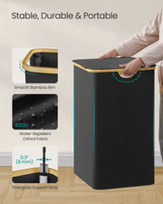 Songmics laundry basket in bedroom setting sorting clothes