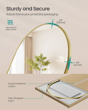 Arched mirror freestanding in a living room setting