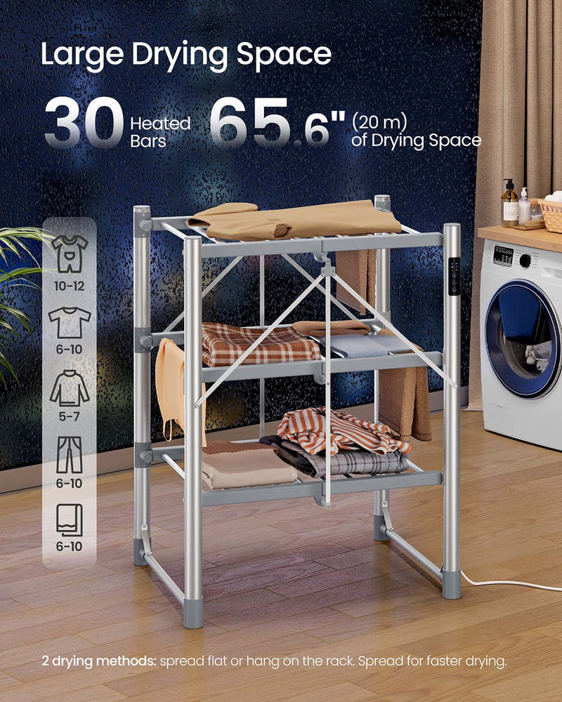 Heated clothes airer with laundry hanging across all 3 tiers