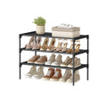 Songmics 3-tier black fabric shoe rack styled with shoes and decor