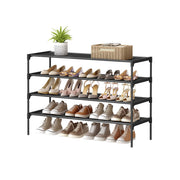 Songmics 4-tier black fabric shoe rack styled with shoes and decor