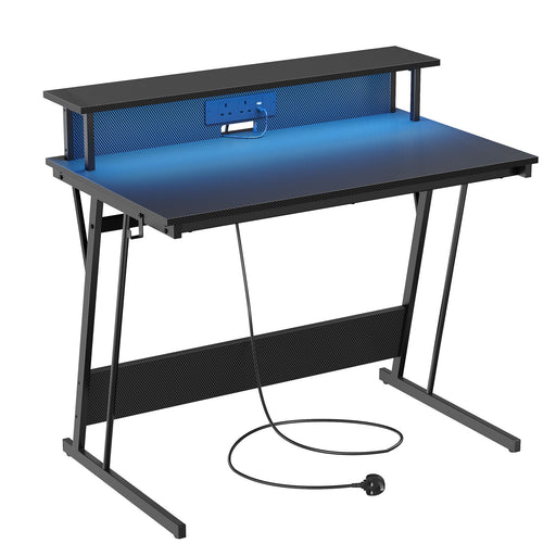 Gaming Desk with LED Lights Built-In Power Outlets and Spacious Work Surface by Vasagle