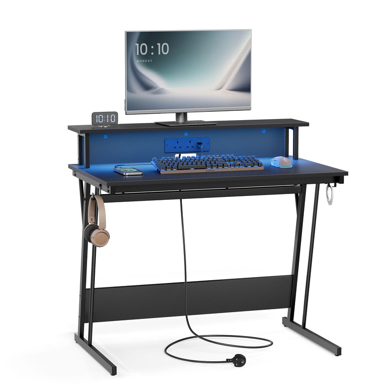 Gaming Desk with LED Lights Built-In Power Outlets and Spacious Work Surface by Vasagle