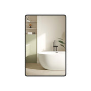 Songmics rectangular wall mirror with black aluminium frame in a bathroom
