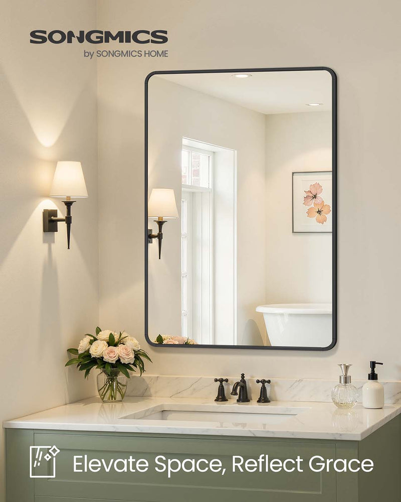 Close-up of the black aluminium frame corner on the wall mirror