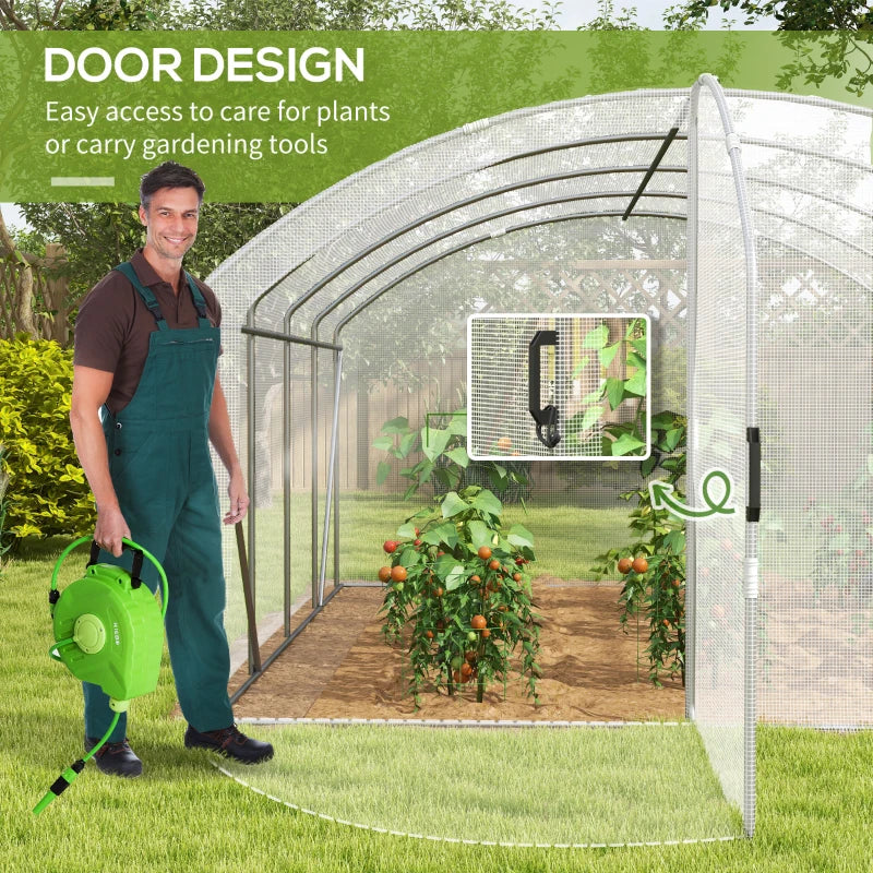 Image of a large walk in polytunnel greenhouse with a large door to the front