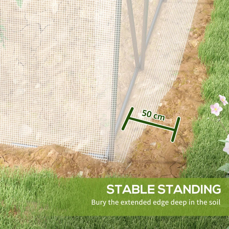 Image of a large walk in polytunnel greenhouse with a large door to the front