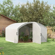 Image of a large walk in polytunnel greenhouse with a large door to the front