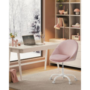 Image of a Modern Velvet Office Chair With Wheels. This is pink with white swivel wheels.