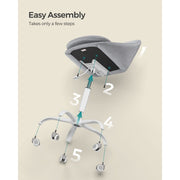 Image of a Modern Velvet Office Chair With Wheels. This is grey with white swivel wheels.
