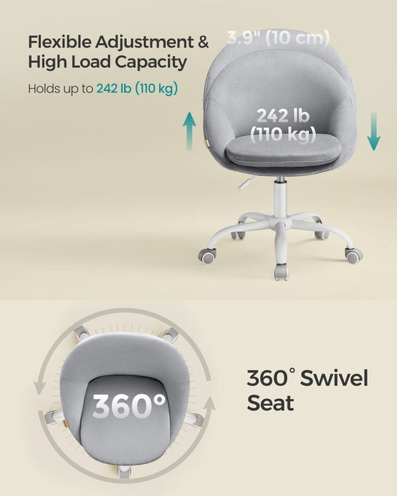 Image of a Modern Velvet Office Chair With Wheels. This is grey with white swivel wheels.