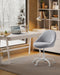 Image of a Modern Velvet Office Chair With Wheels. This is grey with white swivel wheels.