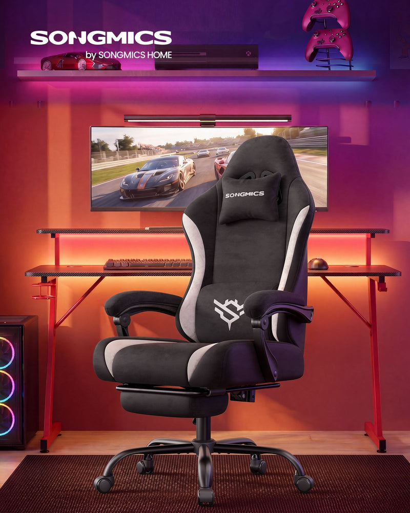 Ink Black gaming chair reclined with footrest extended