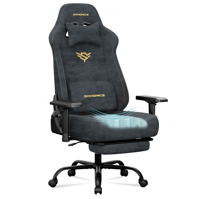 Charcoal Gray suede gaming chair with 4D armrests and footrest, studio shot