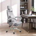 Image of a grey Office Chair With Headrest and Lumbar Support. This ergonomic office chair features lumbar support, a removeable neck pillow, padded arms, extendable footrest, swivel wheels, height adjustable, reclining backrest. It's the perfect chair for ensuring comfort during long work hours and is ideal for home or office.