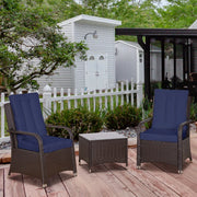 Image of a 3 Piece Patio Bistro Set with 2 brown rattan armchairs with blue cushions and a coffee table with a tempered glass tabletop