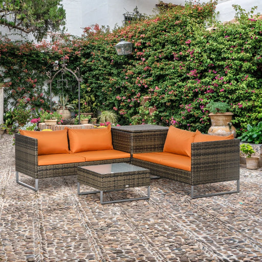 Image of a 4 Seater Rattan Sofa Set With Storage and Table. Brown rattan with orange cushions