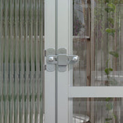Image of an Outsunny Walk in polycarbonate greenhouse with a window on the roof and a sliding door at the front