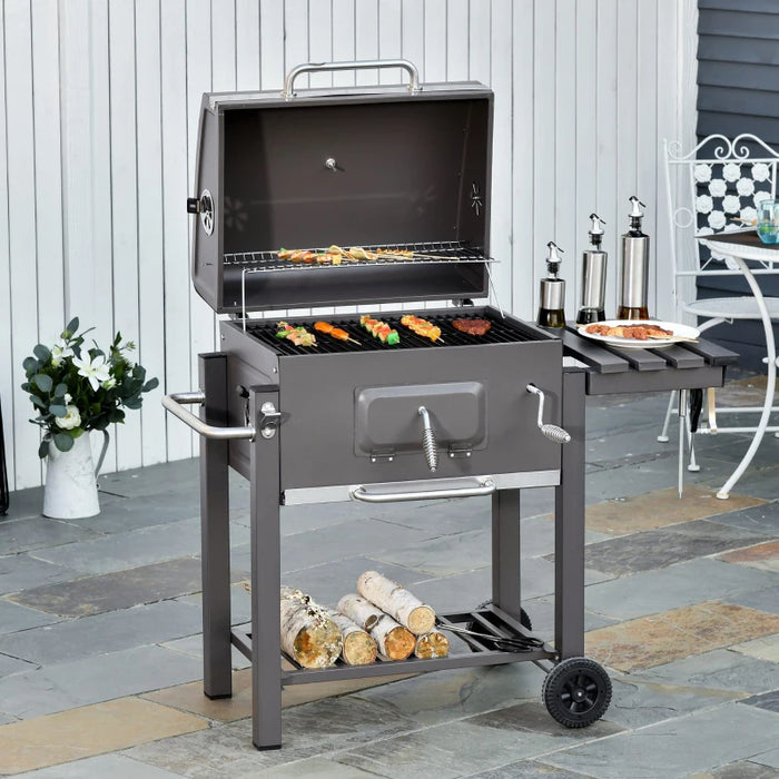Image of a charcoal bbq on wheels with storage, a bottle opener, a thermometer and handles to adjust various features on the barbecue