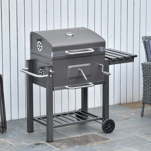 Image of a charcoal bbq on wheels with storage, a bottle opener, a thermometer and handles to adjust various features on the barbecue