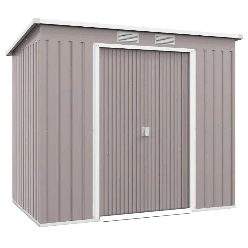 Image of a light grey metal garden storage storage with a sloped roof and double sliding doors on the front