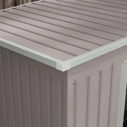 Image of a light grey metal garden storage storage with a sloped roof and double sliding doors on the front