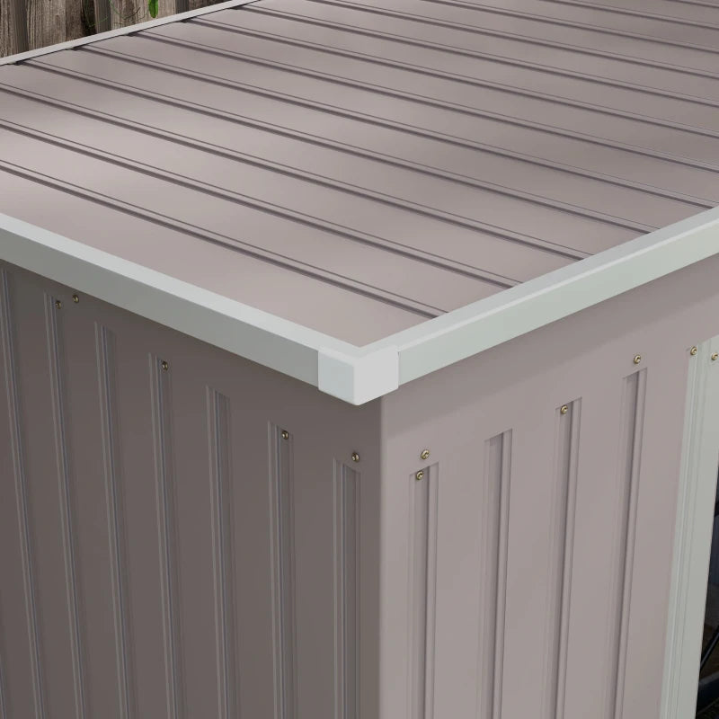 Image of a light grey metal garden storage storage with a sloped roof and double sliding doors on the front