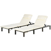 Image of a set of 2 brown rattan sun loungers with cream cushions and reclining backrests