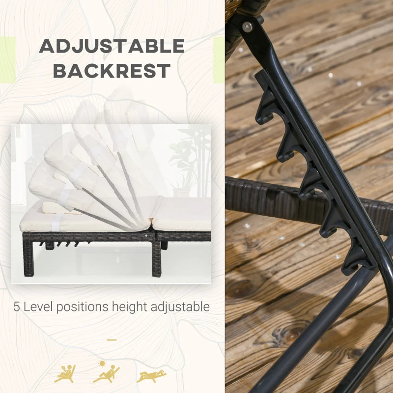 Image of a set of 2 brown rattan sun loungers with cream cushions and reclining backrests