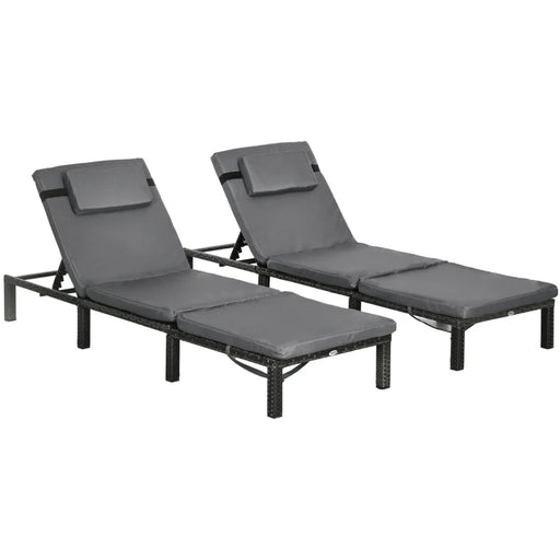 Image of a set of 2 grey rattan sun loungers with dark grey cushions and reclining backrests