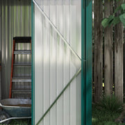 Image of a small green metal garden storage shed measuring 5 by 3 feet with a pent roof and single door to the front