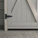 Image of a white wooden garden storage cabinet  with a green felt roof